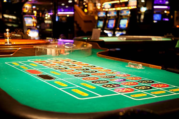Live baccarat table with player and banker hands